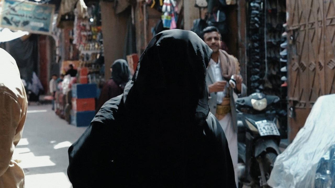 A Stranger in Her Own City backdrop