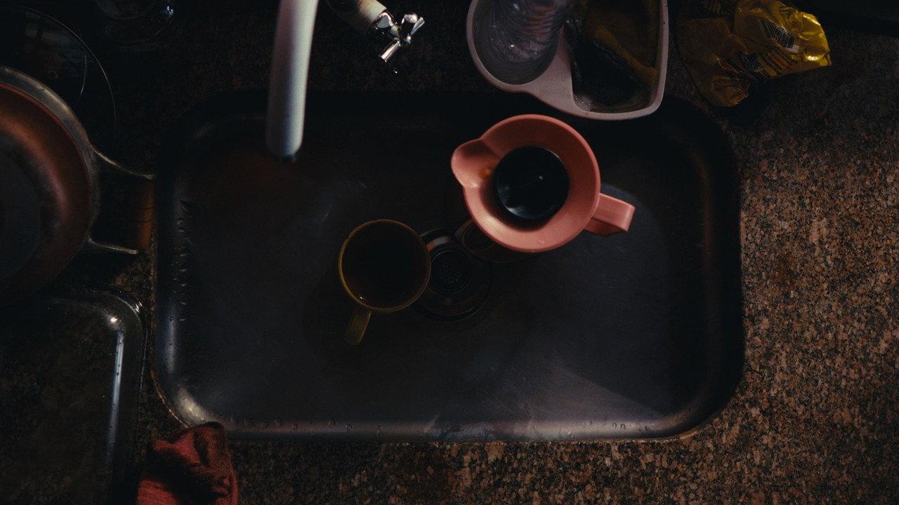The Drain of Routine backdrop