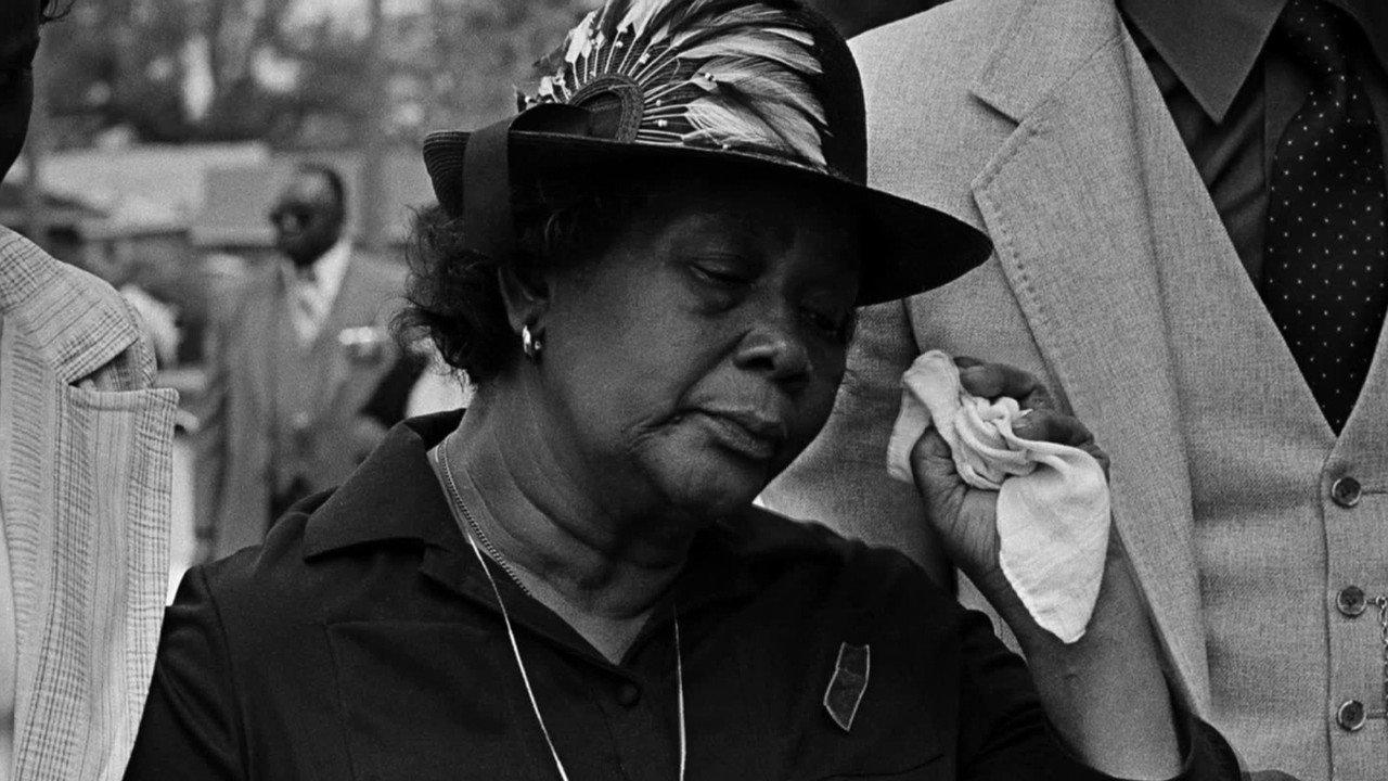 The People v. The Klan backdrop