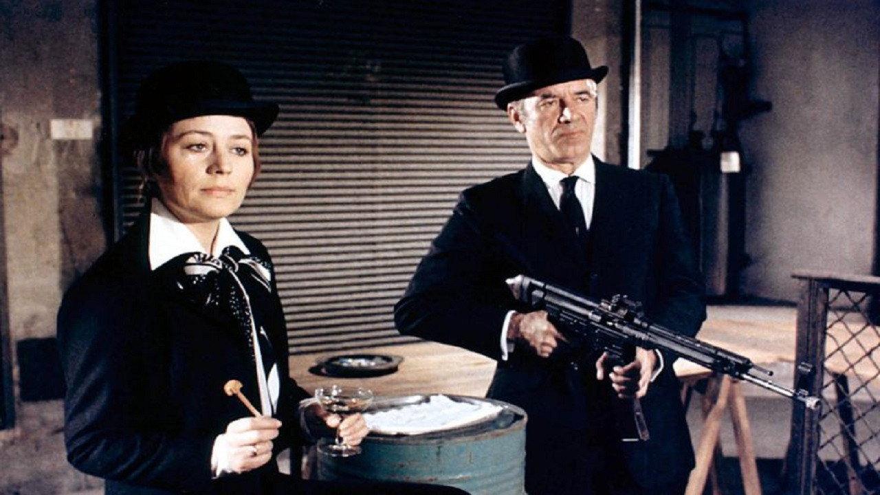 She No Longer Talks, She Shoots backdrop