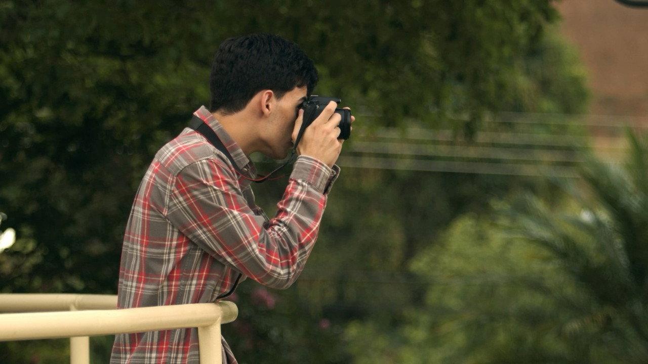 Fotógrafo por trás da foto backdrop