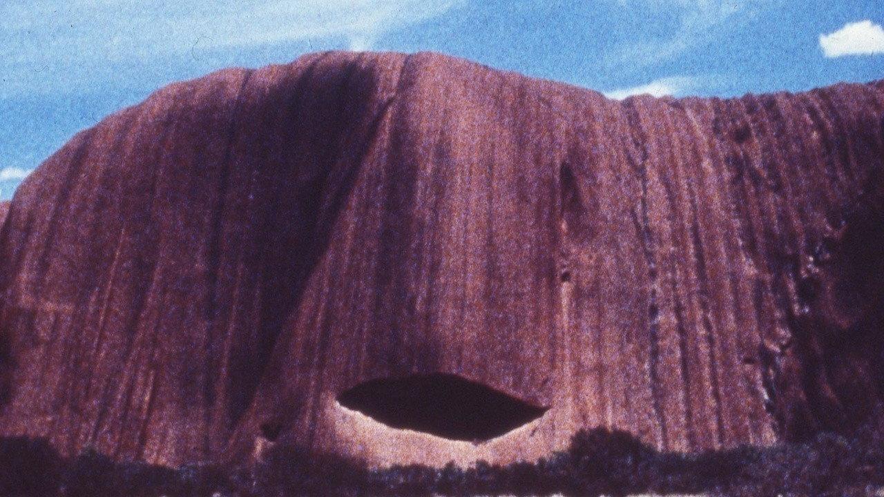At Uluru backdrop
