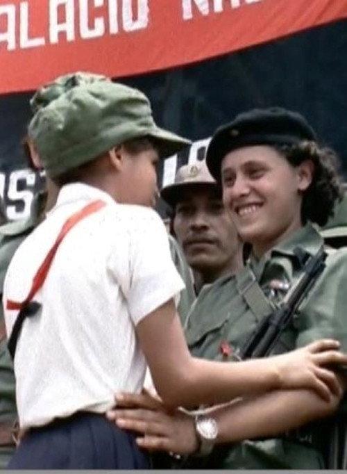 Women in Arms backdrop