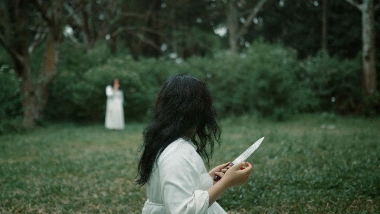 The Woman In White backdrop
