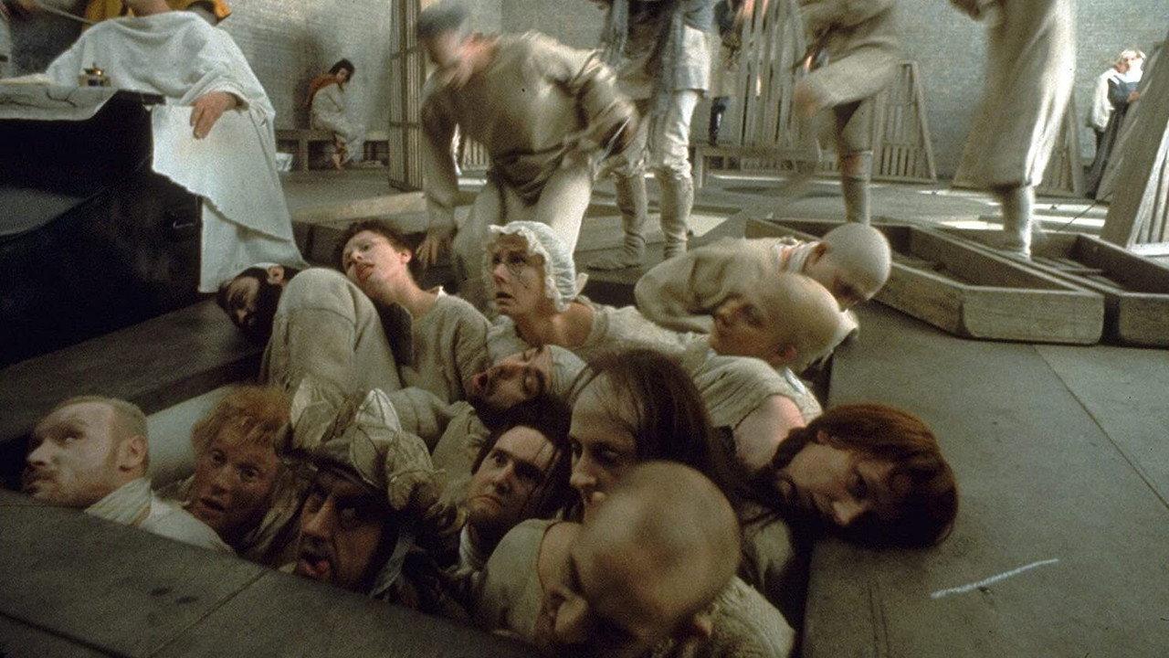 The Persecution and Assassination of Jean-Paul Marat as Performed by the Inmates of the Asylum of Charenton Under the Direction of the Marquis de Sade backdrop