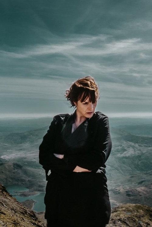 In Absentia backdrop